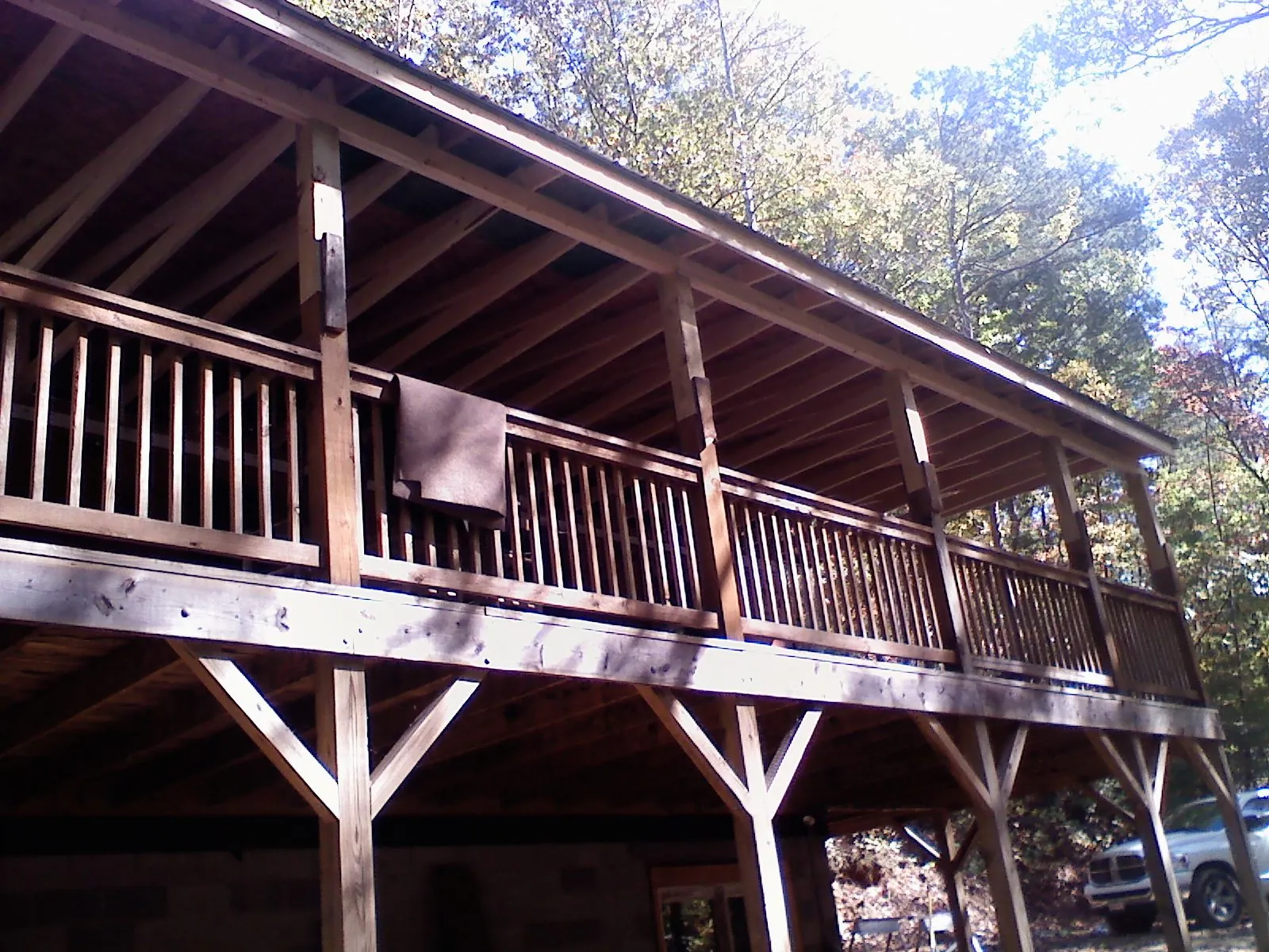 Timber framing under a new elevated porch and deck — Roof Leak Repair in Haywood by Roofing Brothers
